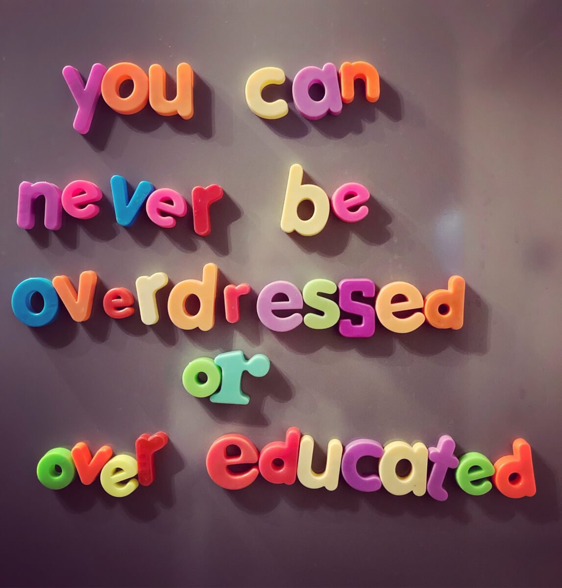 You can never be overdressed or overeducated quote by Oscar Wilde